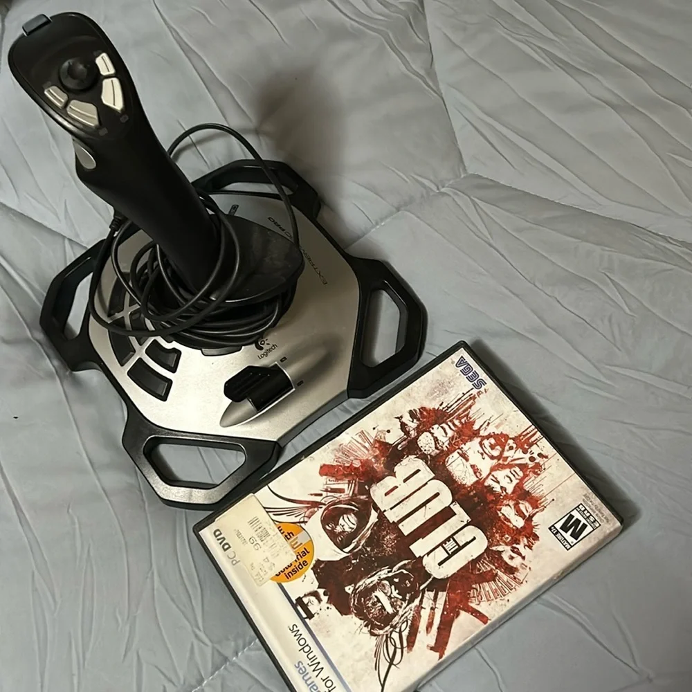 Logitech, extreme 3-D pro joystick/the club a mature game for windows. Vintge